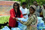 Rtn Indira distributing mosquito nets