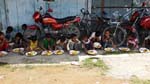 Childrens enjoying foods offered by the Club in Annadan Project