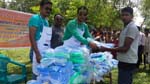 Club President Partha offering  free mosquito nets